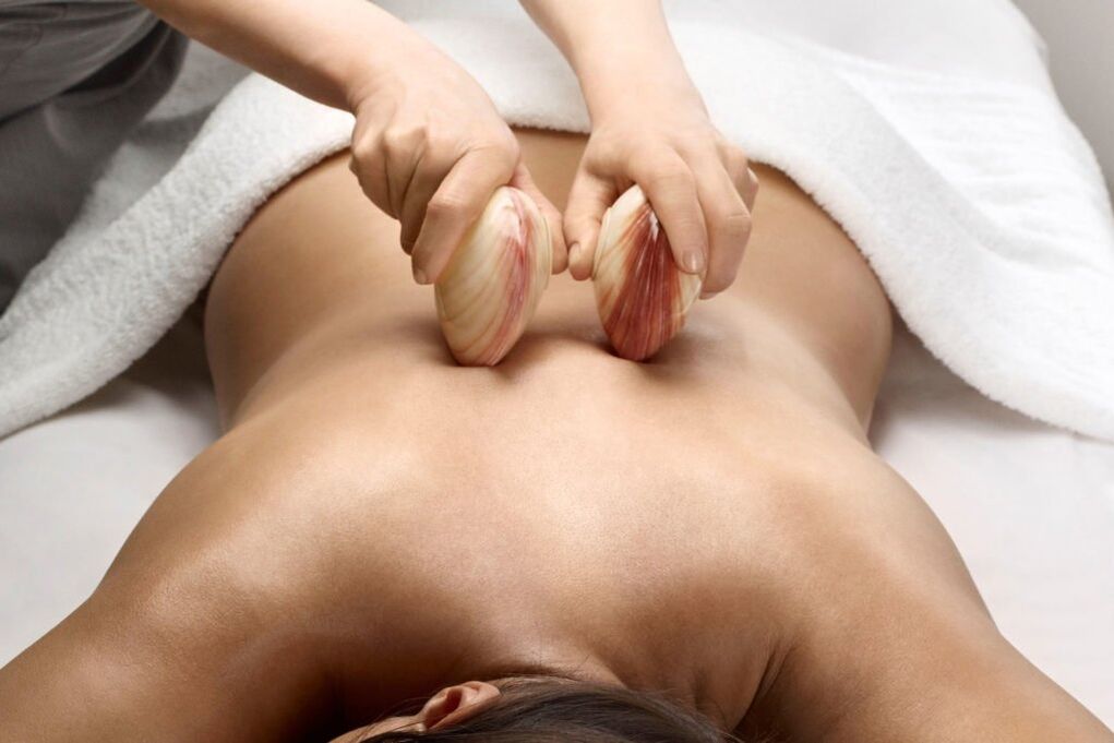 Method of removing pain in osteochondrosis massage